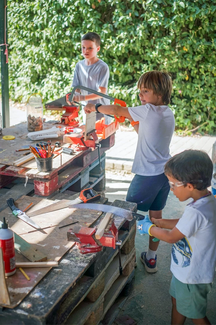 Campers building a construction project
