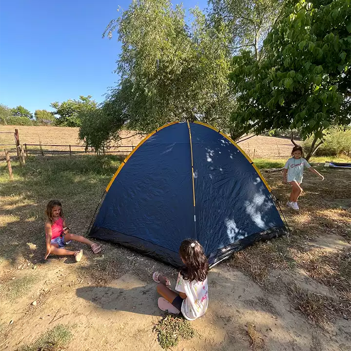 Campers pitching a tent together