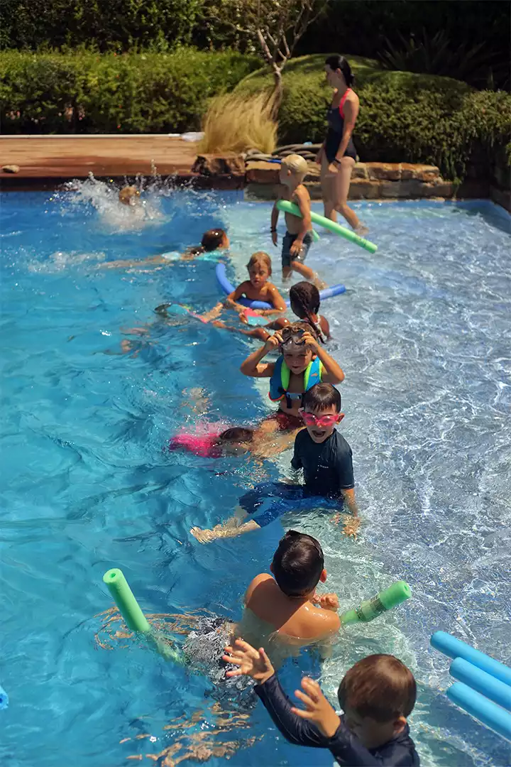 Children enjoying summer water games